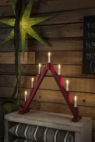 Candelabra 7 Lights ROT Von Konstsmide - Faltbarer elektrischer Kerzenst&auml;nder mit 7 Kerzen, aus rot lackiertem Holz, verziert mit Messingringen um jede Kerze f&uuml;r eine elegante Note.