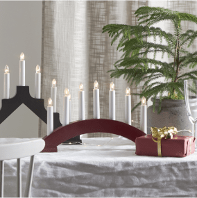 Bea ROT Von Star Trading - Roter Holzkerzenst&auml;nder in Bogenform mit sieben Kerzen.