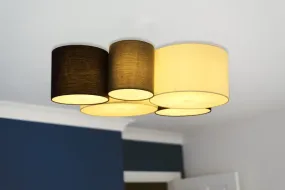 Makki 90cm Mehrfarbig deckenleuchte Von Globo Lighting - Lampan har en unik design med fem cylindriska textilsk&auml;rmar i olika storlekar, varav tv&aring; &auml;r vita, tv&aring; svarta och en gr&aring;.