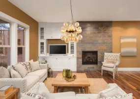 Udo Ø50 Bernstein hängelampe Von Globo Lighting - Lampans sk&auml;rm best&aring;r av vackra glasklot i en varm b&auml;rnstensf&auml;rg, vilket skapar en mjuk och inbjudande ljusst&auml;mning med ett bl&auml;ndfritt, harmoniskt sken.