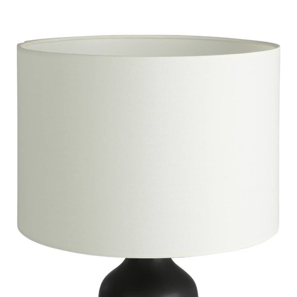 Vinoza 53cm Schwarz tischlampe Von Eglo - Mit einem schwarzen Sockel, der mit minimalistischen Linien verziert ist, die eine Frau mit Hut darstellen, verleiht die Lampe Ihrem Zuhause eine anspruchsvolle und künstlerische Note.