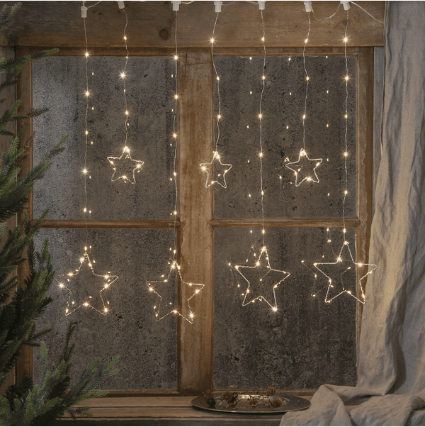 Lichtervorhang Dew Drop Stars 1,2m Silber Von Star Trading - Gardinenschlaufe mit Sterndekor f&uuml;r den Innenbereich.