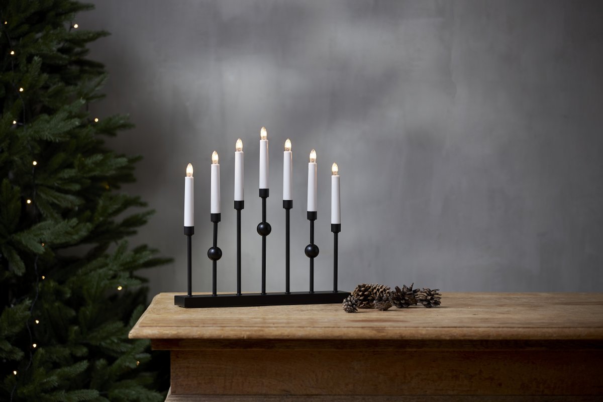 Gustavo Schwarz Von Star Trading - Der Kerzenst&auml;nder verf&uuml;gt &uuml;ber 7 Lichtquellen mit gem&uuml;tlichem Schein.