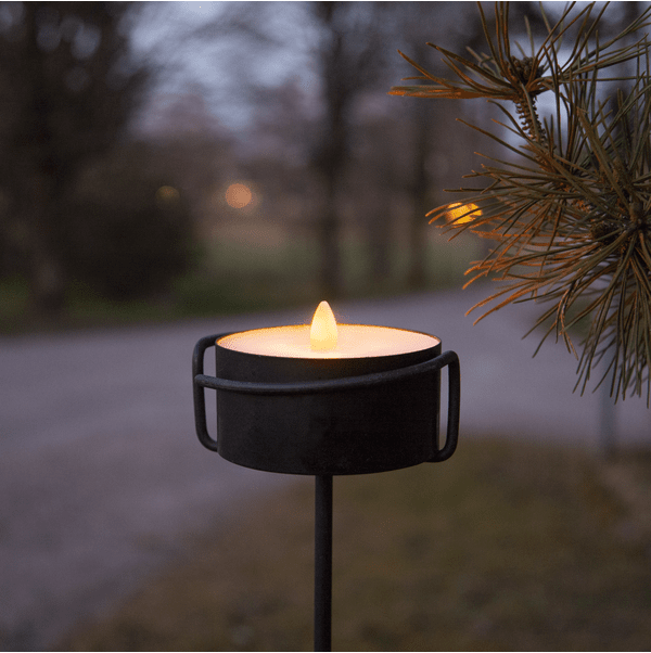 LED Kerze Torch Schwarz Von Star Trading - Beleuchtet mit LEDs, die realistisch brennen.
