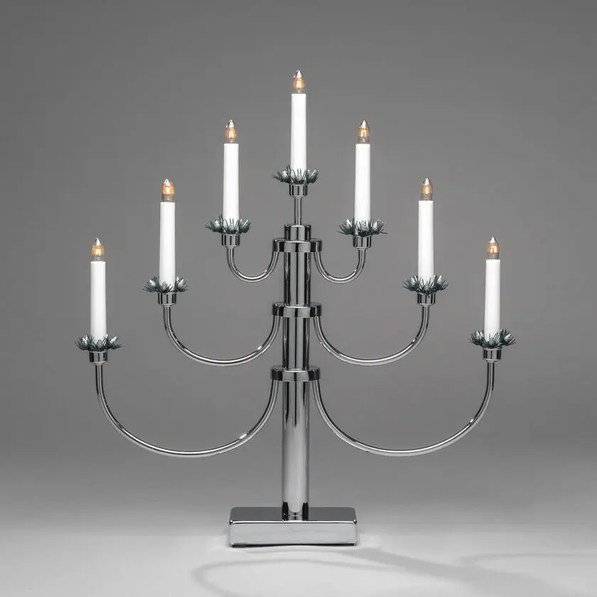Candelabra 7 Lights Chrom Von Konstsmide - Das klassische Design mit seinen sieben Lichtern und dekorativen Details vermittelt ein zeitloses und luxuri&ouml;ses Gef&uuml;hl.