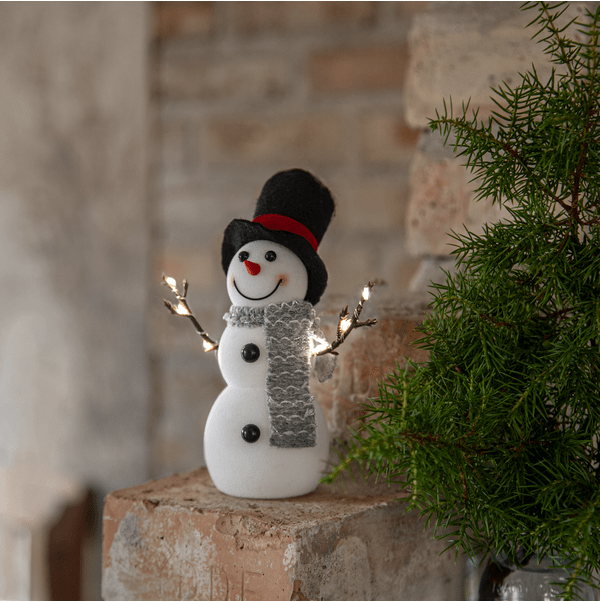 Joylight Schneemann Weiß Von Star Trading - Ein gem&uuml;tlicher kleiner Schneemann, der W&auml;rme und Weihnachtsstimmung im Haus verbreitet.