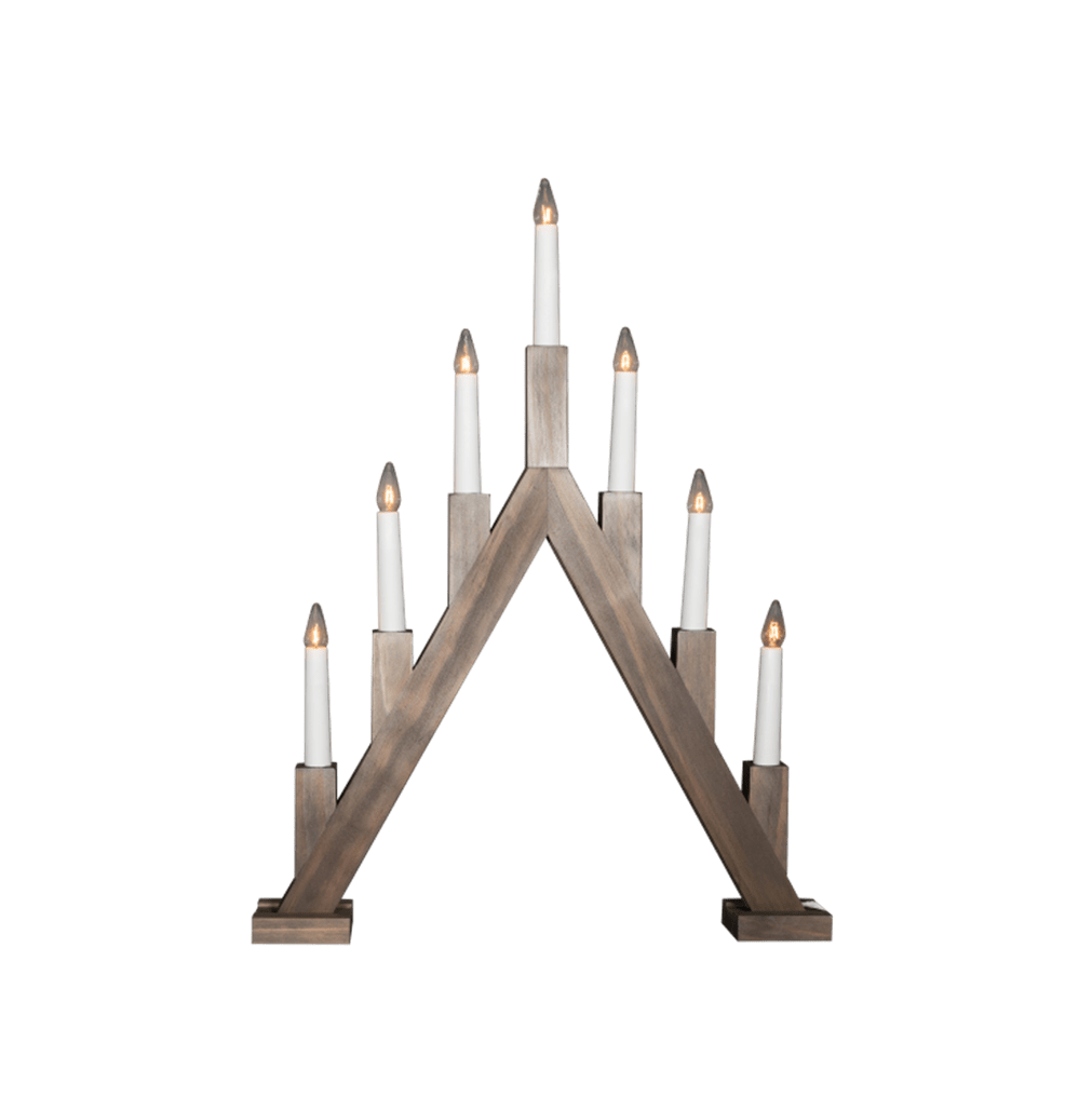 Ellen Brauner Fleck Von Pixie Design - Die spitz zulaufende Form und die sieben Kerzen in unterschiedlichen H&ouml;hen ergeben eine traditionelle Silhouette, die sich wunderbar in die Advents- und Weihnachtszeit einf&uuml;gt.