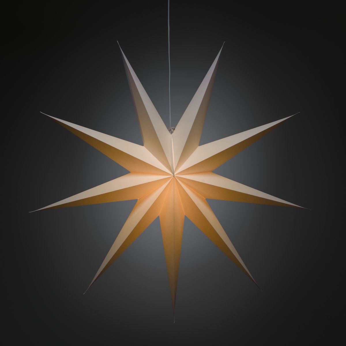 Papierstern Ø115 Weiß Von Konstsmide - Mit seinem stilvollen Design und dem sanften Licht verbreitet es eine ruhige und heimelige Weihnachtsstimmung.