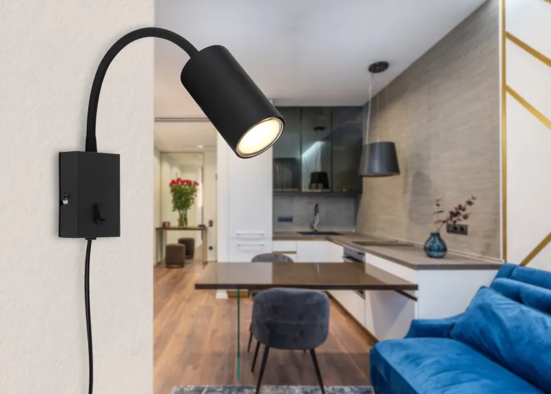 Robby Schwarz leselampe Von Globo Lighting - Robby &auml;r en klassisk, kompakt v&auml;gglampa tillverkad i plast och mattsvart metall, vilket ger en stilren och modern look.