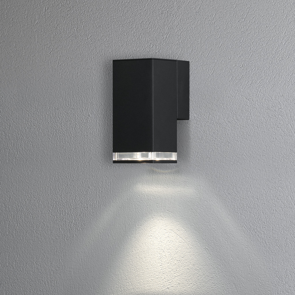 Pollux Schwarz außenlampe Von Konstsmide - Die Lampe richtet das Licht nach unten und erzeugt einen weichen und angenehmen Schein, der im Außenbereich für Sicherheit und Eleganz sorgt.