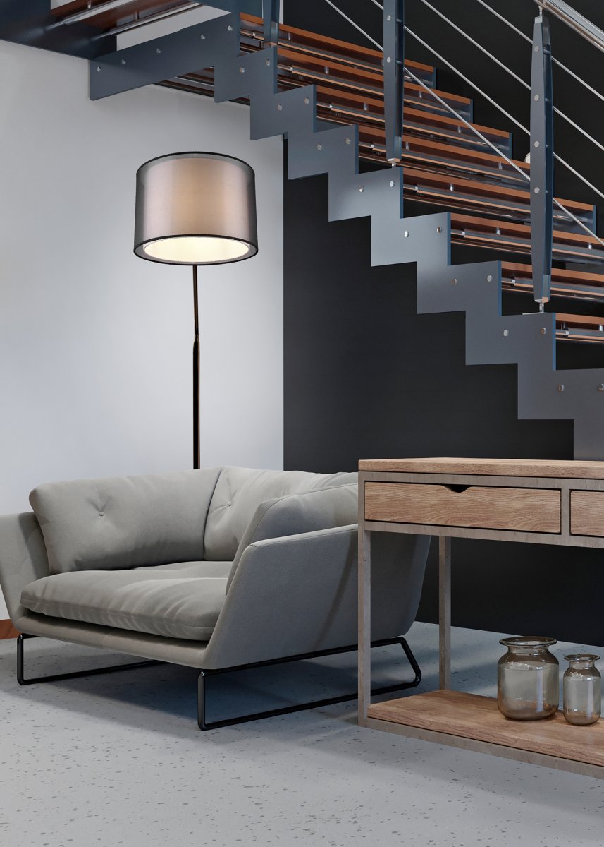 Burton Schwarz stehlampe Von Trio Lighting - Die moderne Kombination aus einem inneren weißen Stoffschirm und einem äußeren transparenten schwarzen Kunststoffschirm wirkt individuell und erfrischend zugleich und lässt sich in moderne Wohnwelten integrieren.