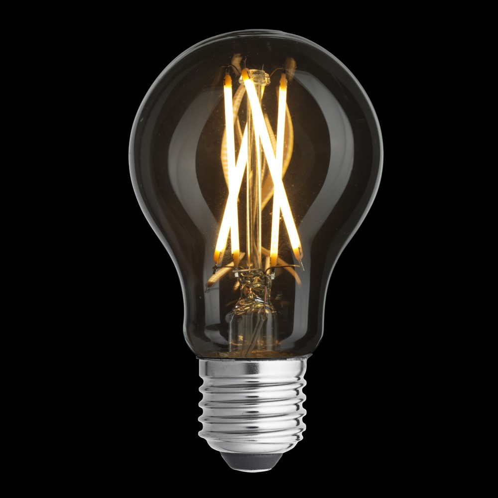 E27 normal 4W 2700K Transparent Von Unison - Entdecken Sie zeitloses Design und energieeffiziente Beleuchtung mit dieser klassischen, klaren E27-Lichtquelle.