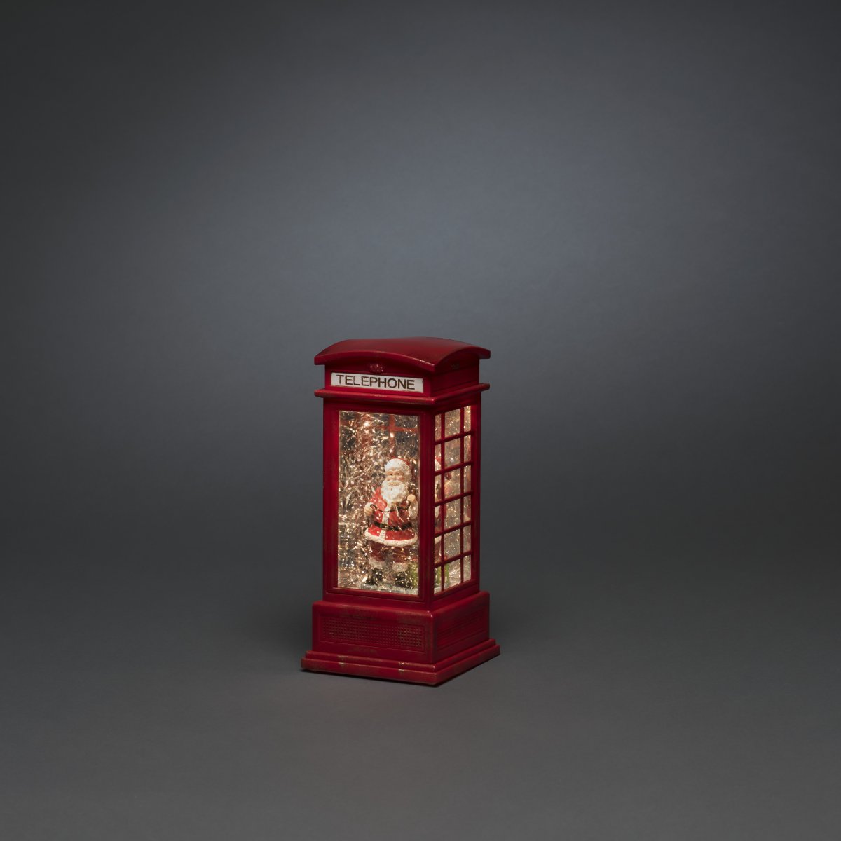 Wassergefüllte Laterne Telefonzelle ROT Von Konstsmide - Die mit Wasser gef&uuml;llte Laterne in Form einer Telefonzelle ist eine stimmungsvolle Weihnachtsdekoration mit einem charmanten Weihnachtsmann in einer klassischen roten Telefonzelle.