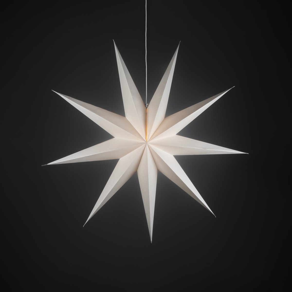Papierstern Ø115 Weiß Von Konstsmide - Das schlichte, elegante Design verbreitet ein sanftes und angenehmes Licht, das in der Advents- und Weihnachtszeit f&uuml;r eine harmonische Stimmung sorgt.
