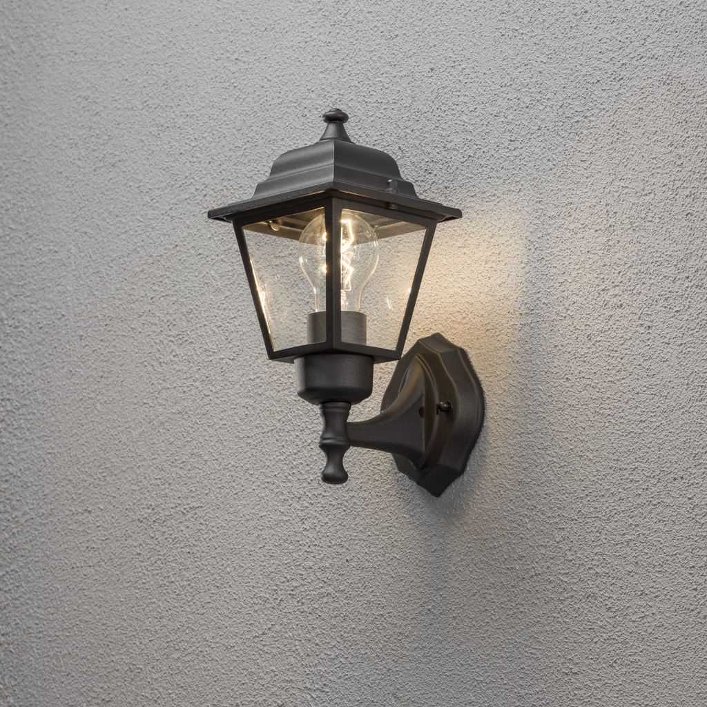 Vägglykta Schwarz außenlampe Von Konstsmide - Schaffen Sie mit dieser stilvollen Beleuchtung, die Funktion und Ästhetik vereint, eine zeitlose und einladende Atmosphäre an Ihrer Fassade.
