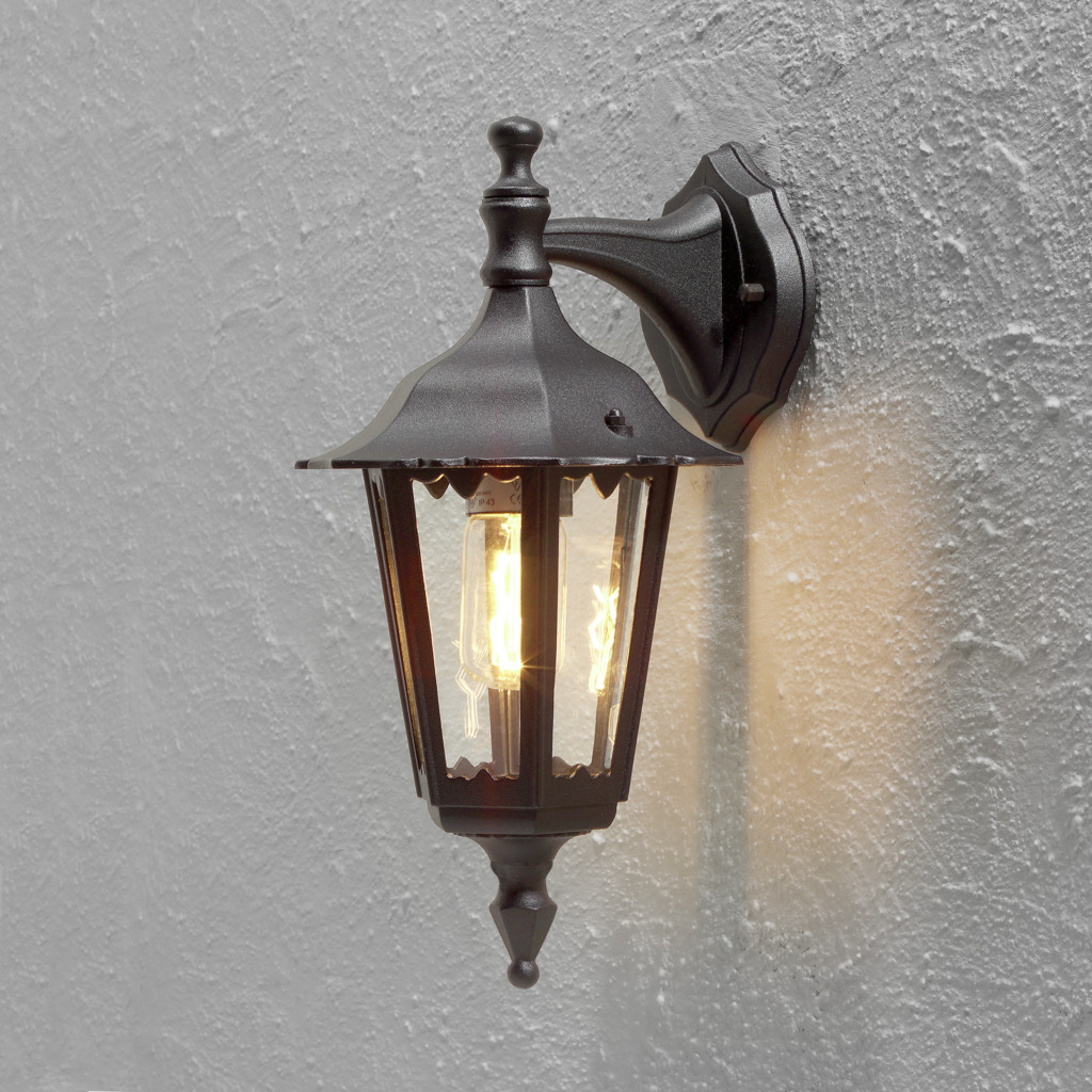 Firenze Schwarz außenlampe Von Konstsmide - Das elegante Design und das warme Licht der Lampe schaffen eine einladende Atmosphäre, die sich perfekt für Eingänge und Terrassen eignet.