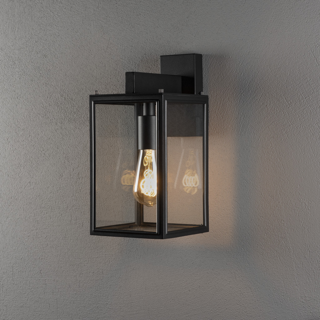 Carpi Schwarz außenlampe Von Konstsmide - Die Lampe eignet sich ideal für Eingänge oder Terrassen und spendet ein schönes, sanftes Licht, das eine einladende Atmosphäre schafft.