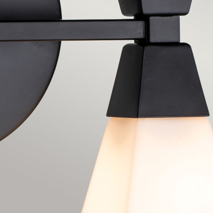 Bowtie 34cm Schwarz badezimmerlampe Von Elstead Lighting - Die mattschwarze Bowtie-Wandleuchte ist eine moderne Spiegelleuchte mit Schutzart IP44 und eignet sich daher für Badezimmer, aber auch für andere Innenräume wie Waschküchen oder Gäste-WCs.