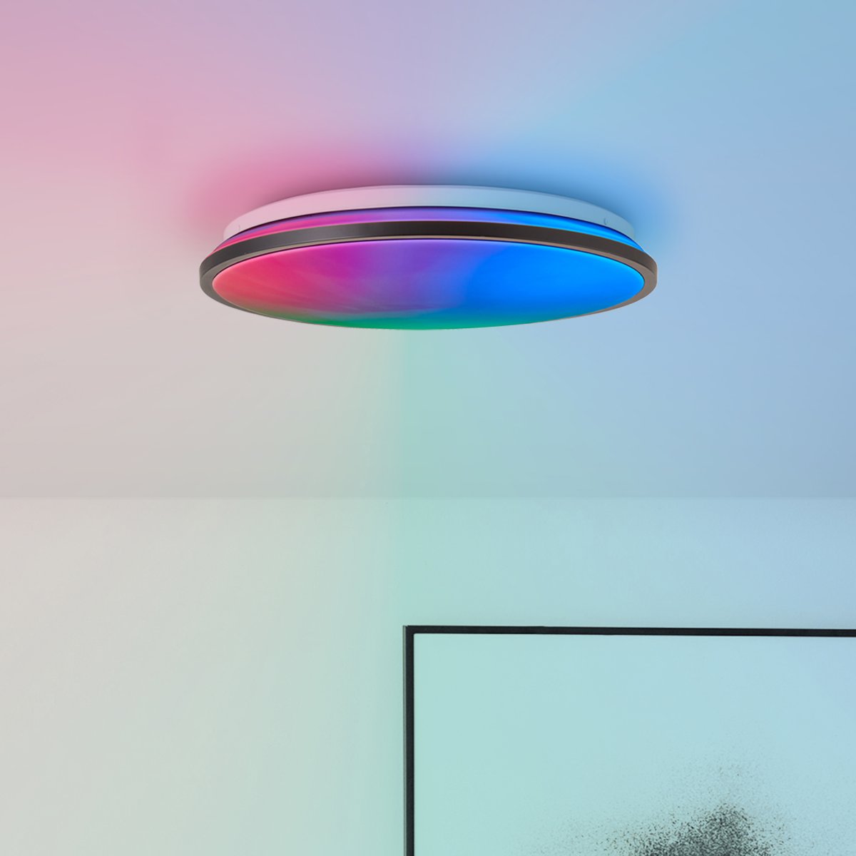 Heida Ø40 Schwarz deckenleuchte Von Brilliant - Der schwarze Rahmen umschlie&szlig;t das LED-Panel, das ein helles Licht ausstrahlt, das sich mit der mitgelieferten Fernbedienung dimmen l&auml;sst.