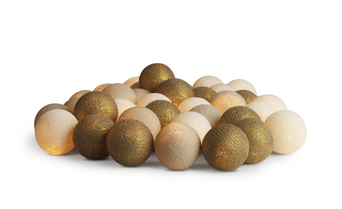 Irislights Gold 20-lights Gold Von Irislights - Die elegante Lichterkette Gold von Irislights ist eine wundersch&ouml;ne Lichtquelle aus handgefertigten Kugeln aus Baumwolle und Polyester.