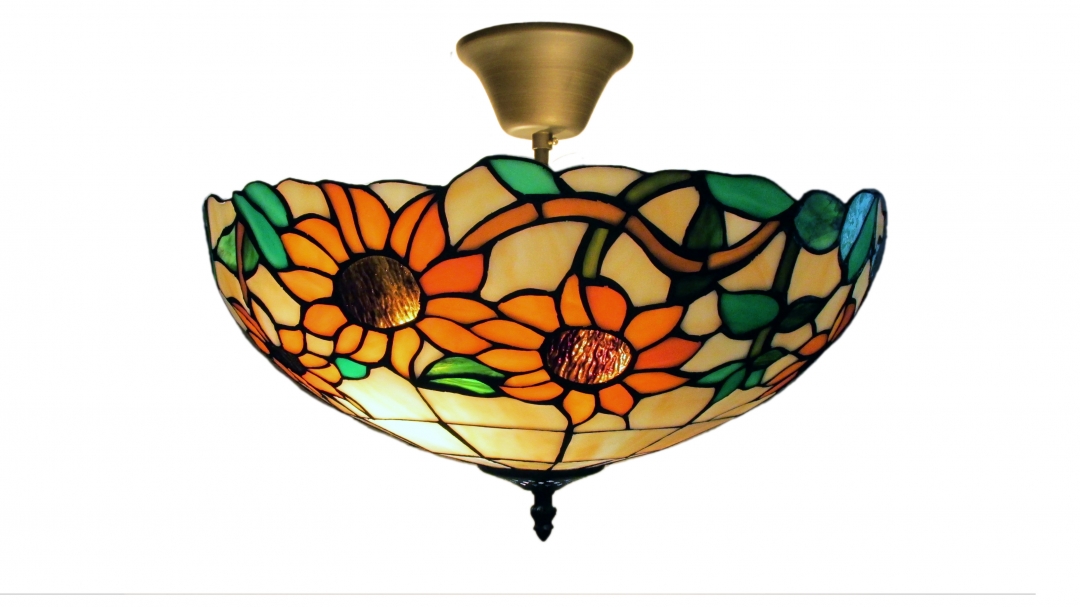 Solros Ø40 Mehrfarbig Von Norrsken Design - Sunflower ist eine klassische Tiffany-Lampe mit einem wunderschönen Design mit Sonnenblumen und Blättern in verschiedenen Farben.