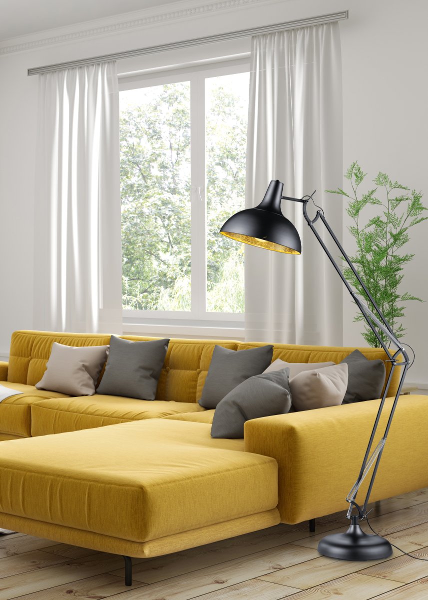 Salvador Schwarz stehlampe Von Trio Lighting - Die Stehleuchte Salvador vereint modernes Industriedesign mit dem eleganten Schwarz-Gold-Trend und sorgt so f&uuml;r eine stimmungsvolle Atmosph&auml;re in Ihrem Zuhause.