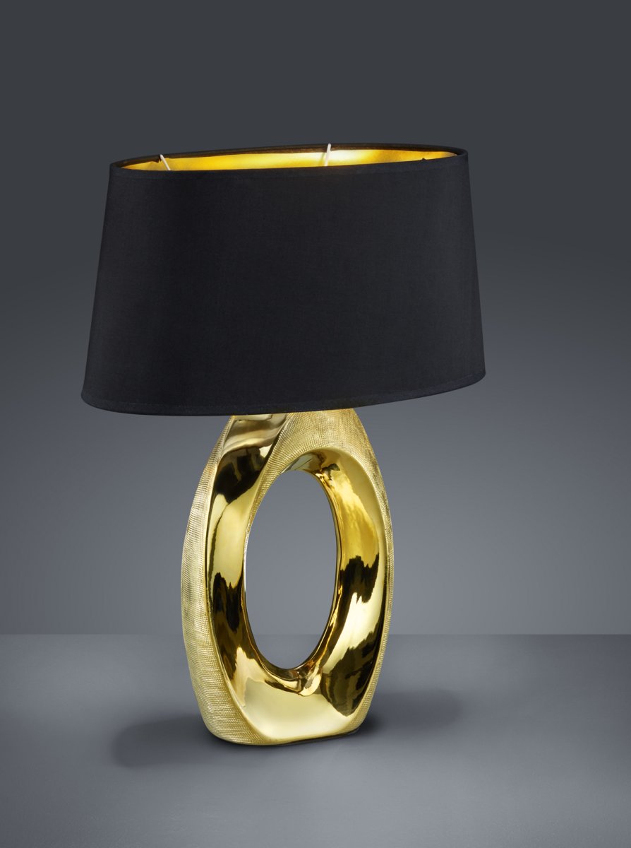 Taba 52cm Gold tischlampe Von Trio Lighting - Die trendige Farbkombination aus Schwarz und Gold vermittelt einen eleganten und modernen Eindruck.